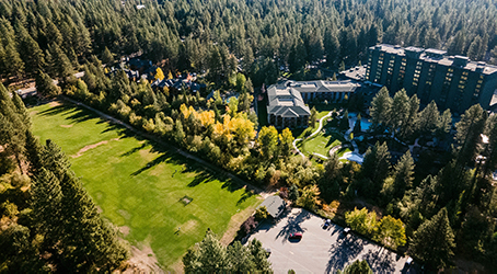 drone shot of village green aspens and Hyatt Lake Tahoe in Incline Village