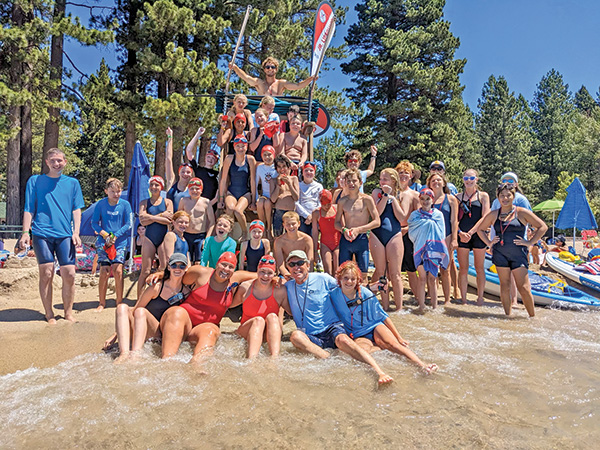 group of junior lifeguards pose 