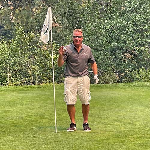 scot cruse with hole in one ball at the Incline Village Mountain Golf Course