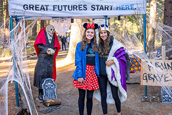 boys and girls club north lake tahoe booth at trail of treats two women dressed in costume