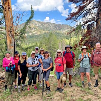 seniors on a hike with mountain views