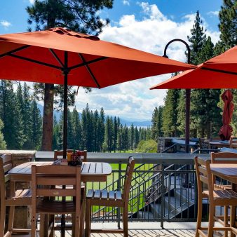 the grille deck seating with umbrellas
