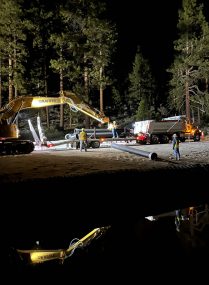 pipeline workers at night