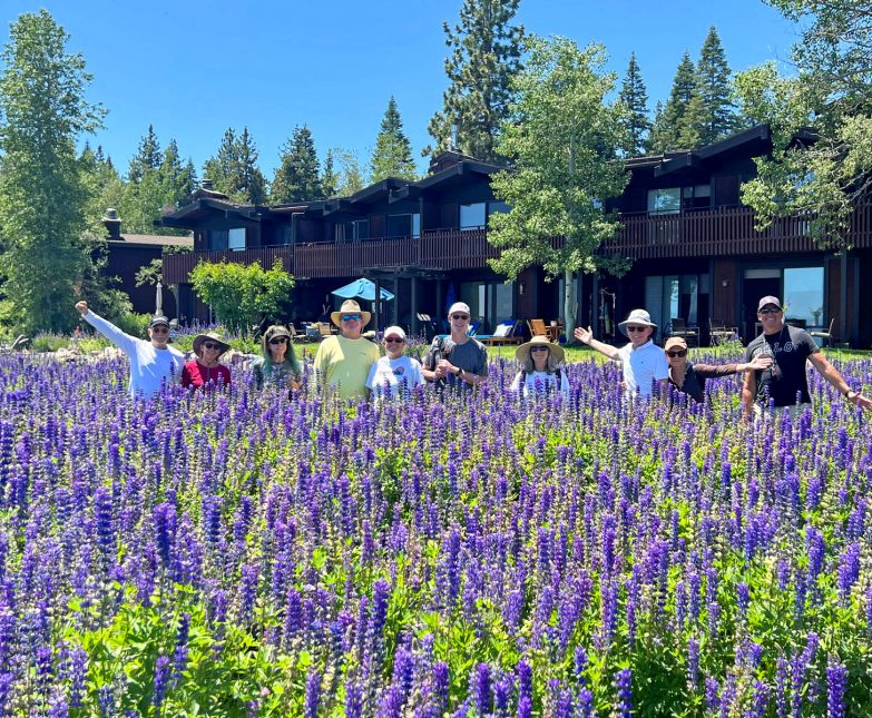 seniors walking through lupines