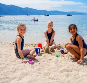 girls playing on beach