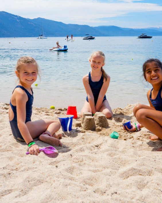 girls playing on beach
