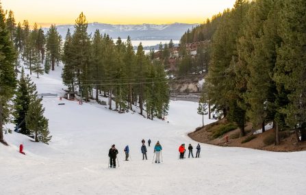 group snowshoe hikes during sunset at diamond peak