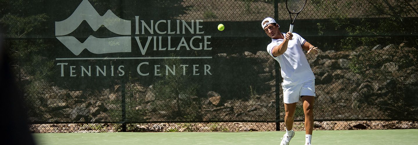 Tennis Pro Dominic Morelli hitting a forehand