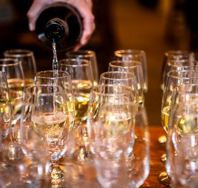 wine pouring at Mountain Golf Course Nine & Wine event