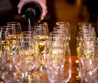 wine pouring at Mountain Golf Course Nine & Wine event