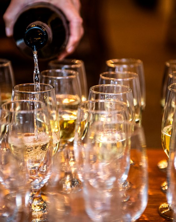 wine pouring at Mountain Golf Course Nine & Wine event