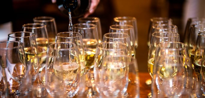 wine pouring at Mountain Golf Course Nine & Wine event