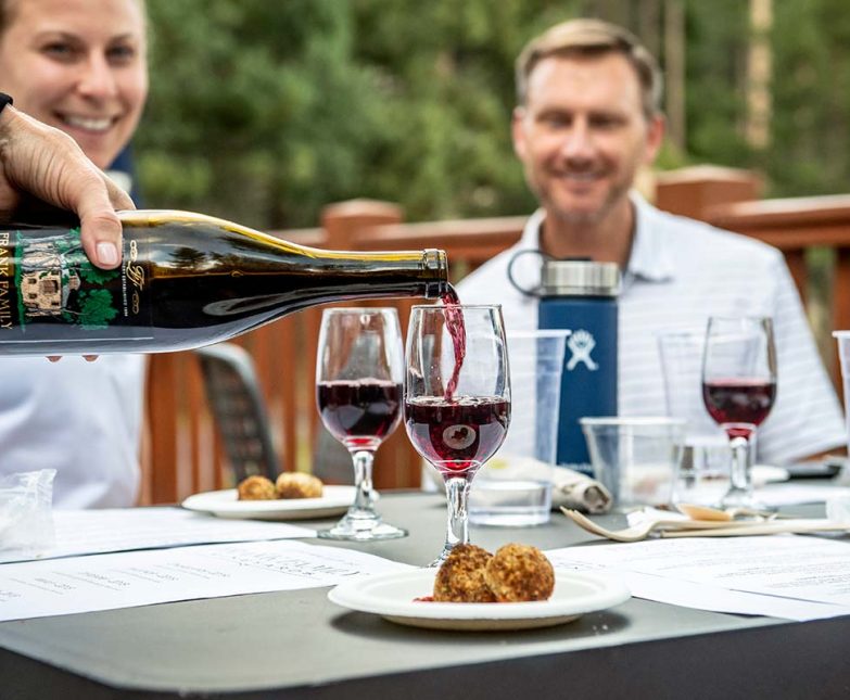 wine pouring at nine and wine