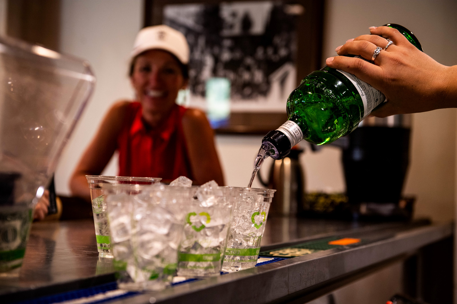 bar with woman in background
