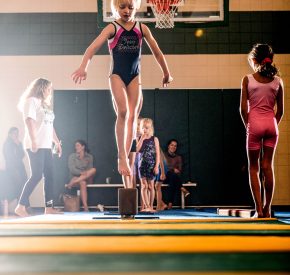 gymnast balance beam jump