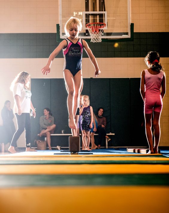gymnast balance beam jump