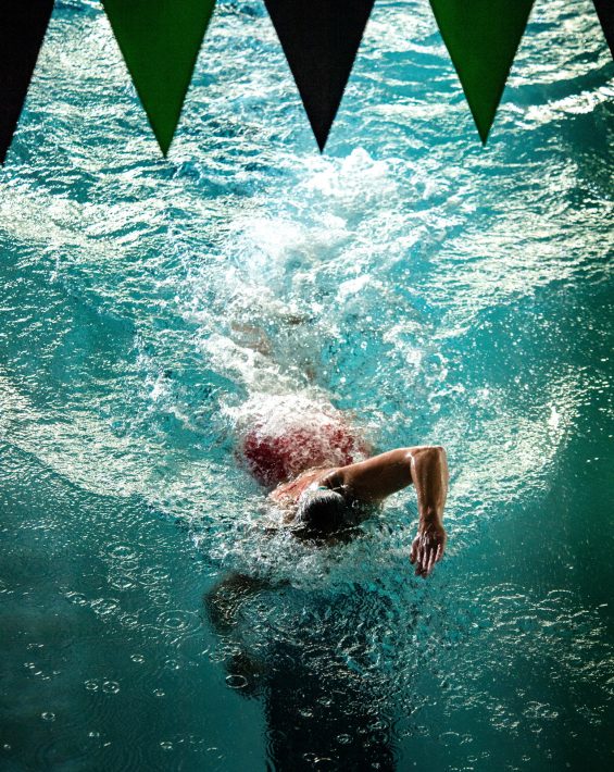 woman swimming in rec center pool