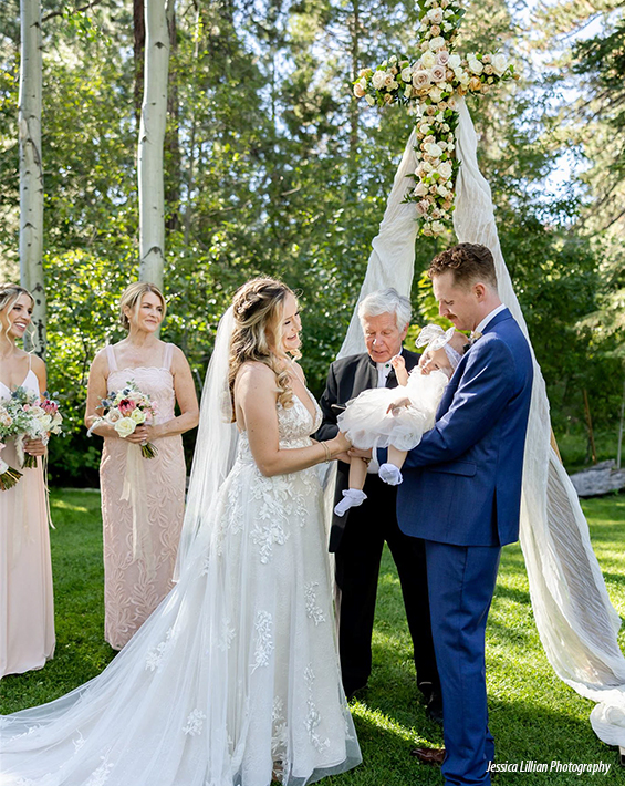 wedding couple at alter aspen grove