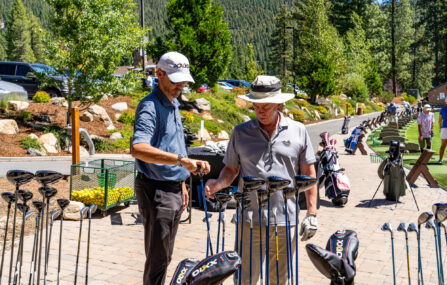 man with club fitter at the range