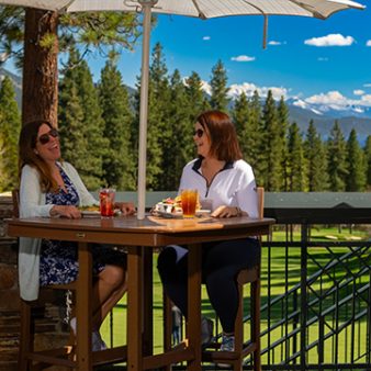 women on patio