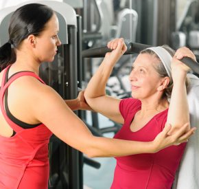 personal trainer with woman