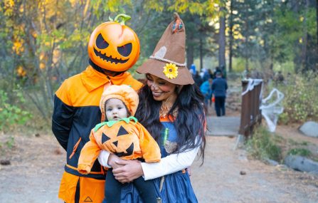 family at trail of treats Halloween event