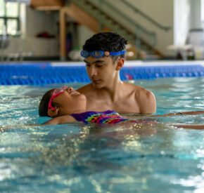 hispanic boy in swim lessons