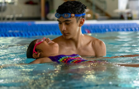 hispanic boy in swim lessons