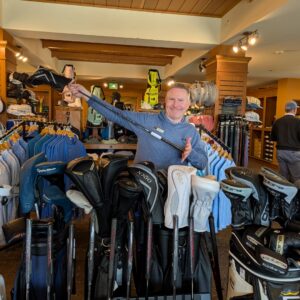 golf shop merchandise staff dads and grads pick greg with a golf club