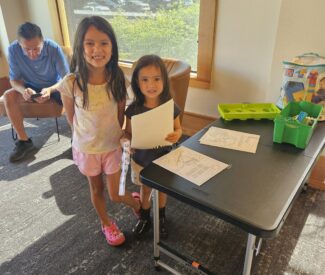 kids at community open house at Chateau