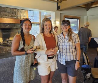 group at community open house at Chateau