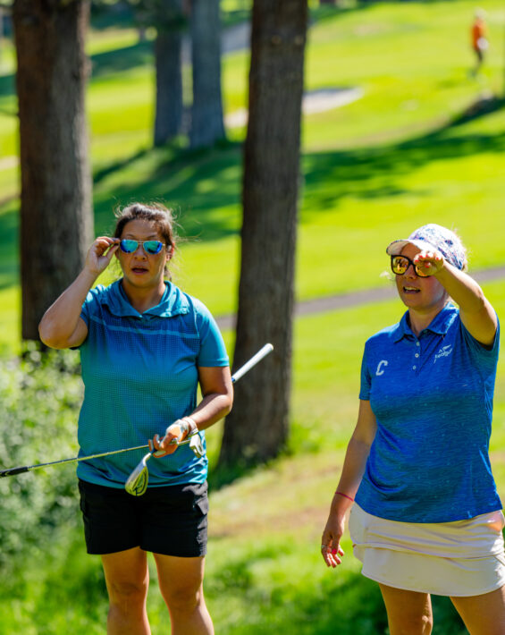 on course clinic coach and female player