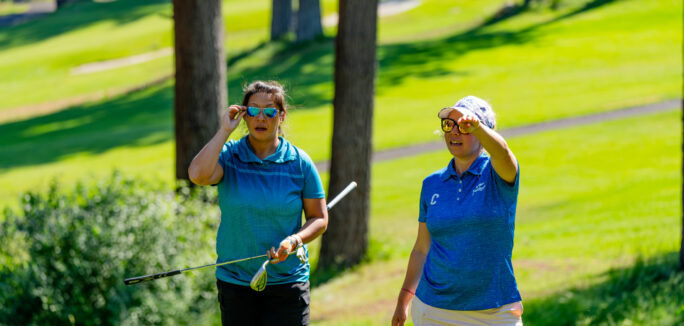 on course clinic coach and female player
