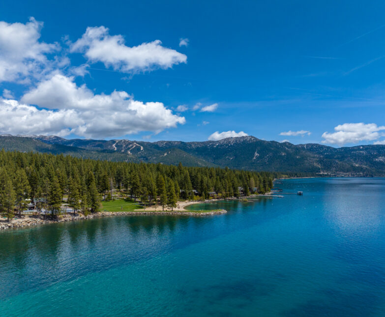drone view of lake and mountains
