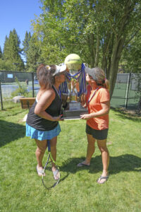 tennis tournament winners kiss trophy