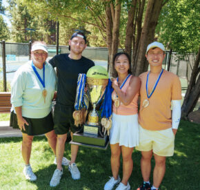 tennis tournament winners with trophy