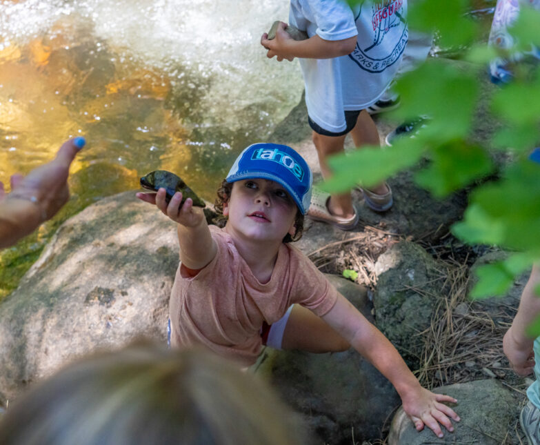 kids at recreation camp outdoor scavenger hunt