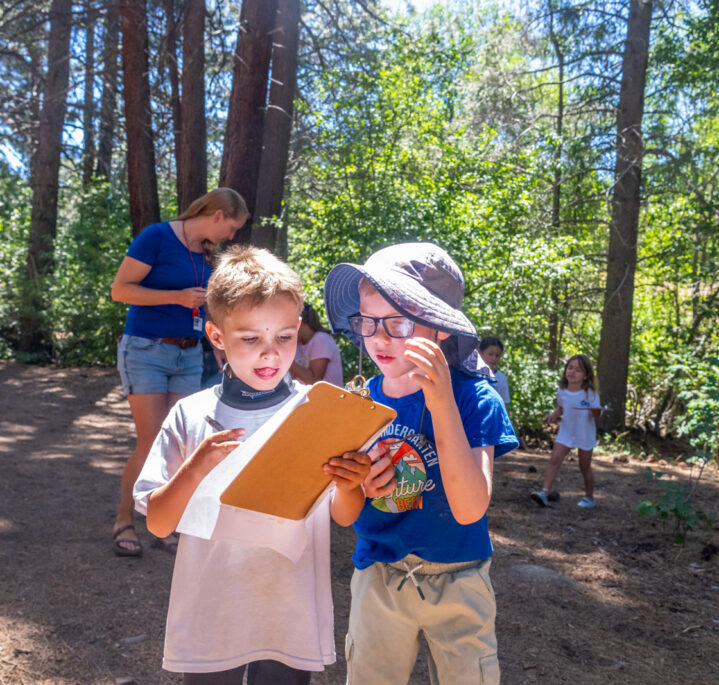 kids at recreation camp outdoor scavenger hunt