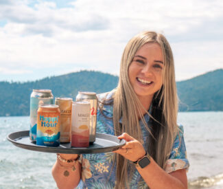 server with drinks at ski beach