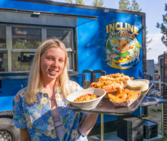 server with food at ski beach Incline Surf Shack