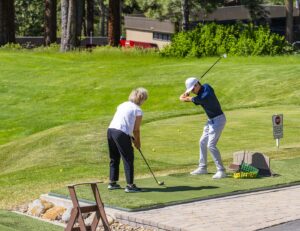 Carson Kristich teaching a golf lesson