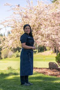 Chef Jazmine posing outside The Chateau