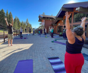 yoga class on the deck at Diamond Peak