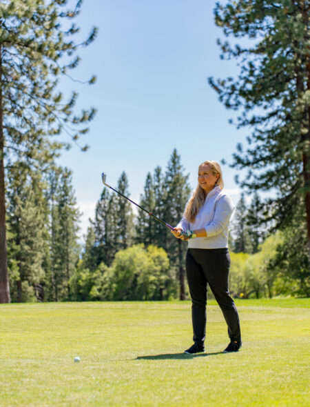 Ashley Wolford holding golf club