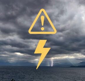 lightning alert graphic over stormy lake tahoe
