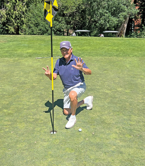 phil hole in one pose