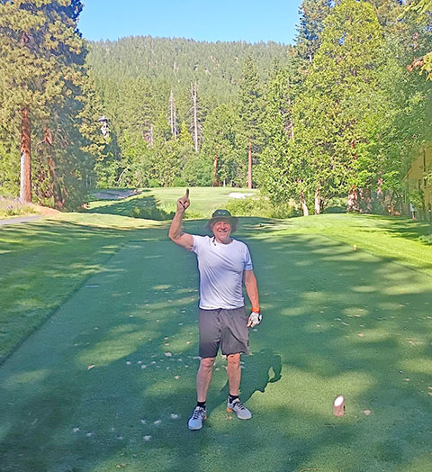 mark munoz hole in one pose